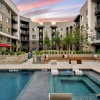 pool with spacious areas and lush landscaping