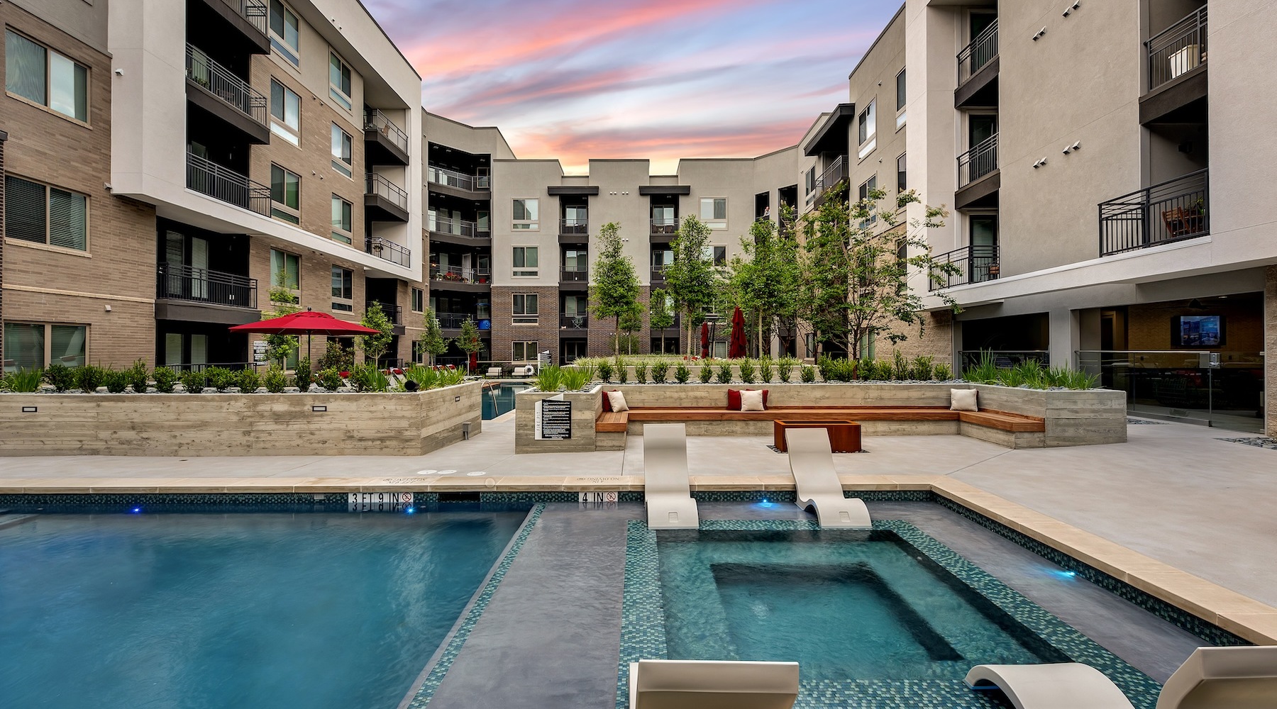 pool with spacious areas and lush landscaping