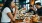 a woman eating with friends