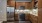 a kitchen with wooden cabinets
